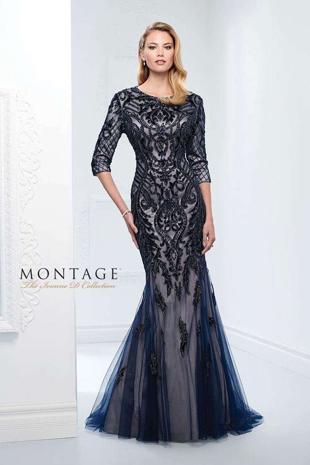 Evening gown with three-quarter sleeves & bateau neckline.