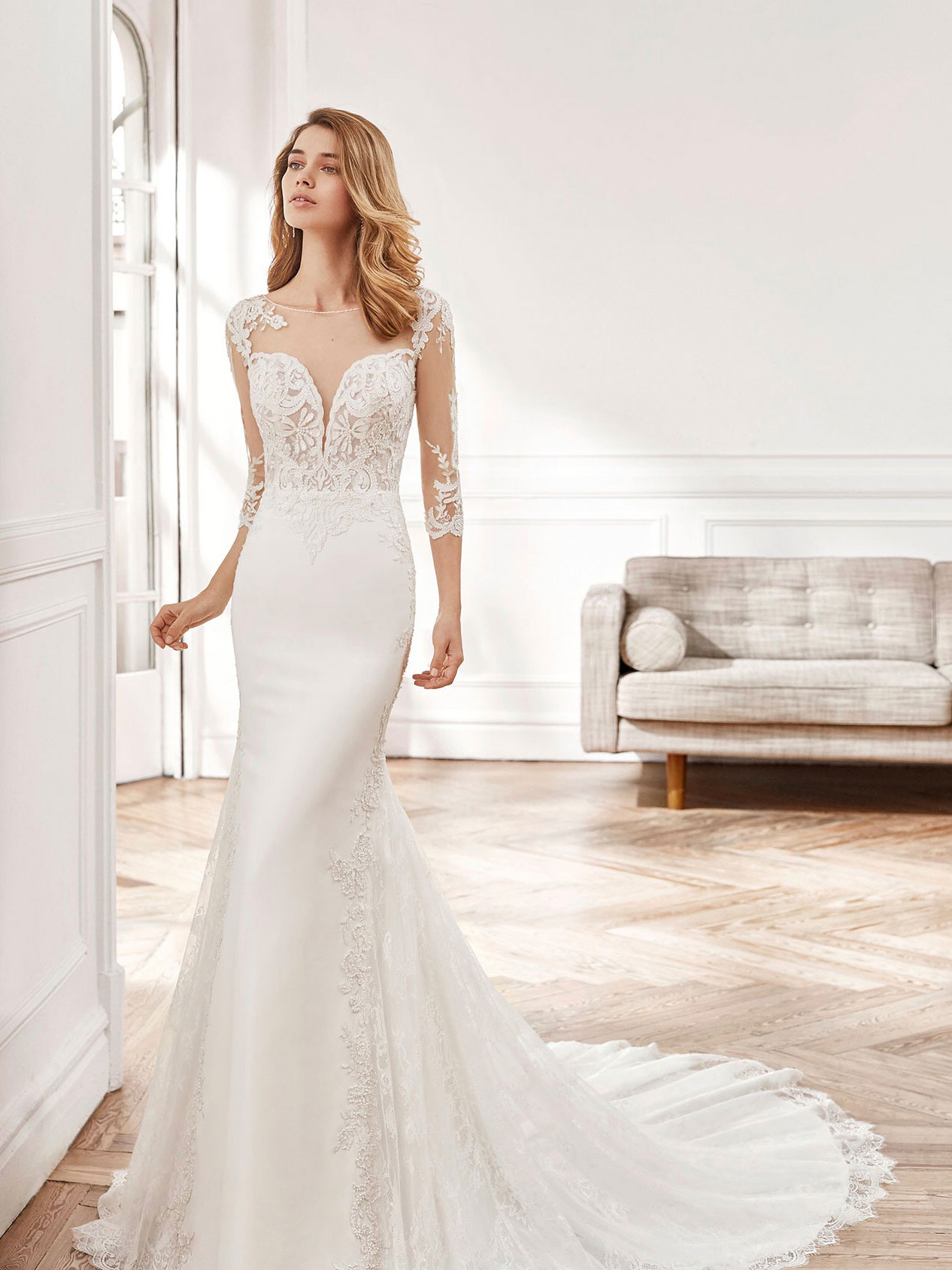 Elegant wedding dress with beautiful crepe and three-quarter-length sleeves